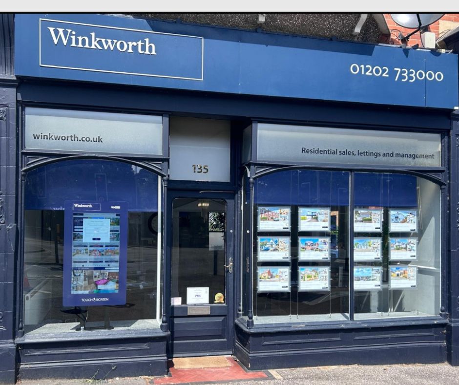 A digital in-window touchscreen at Winkworth Estate Agents, Poole, UK